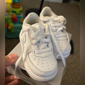 White hard bottom Air Force ones